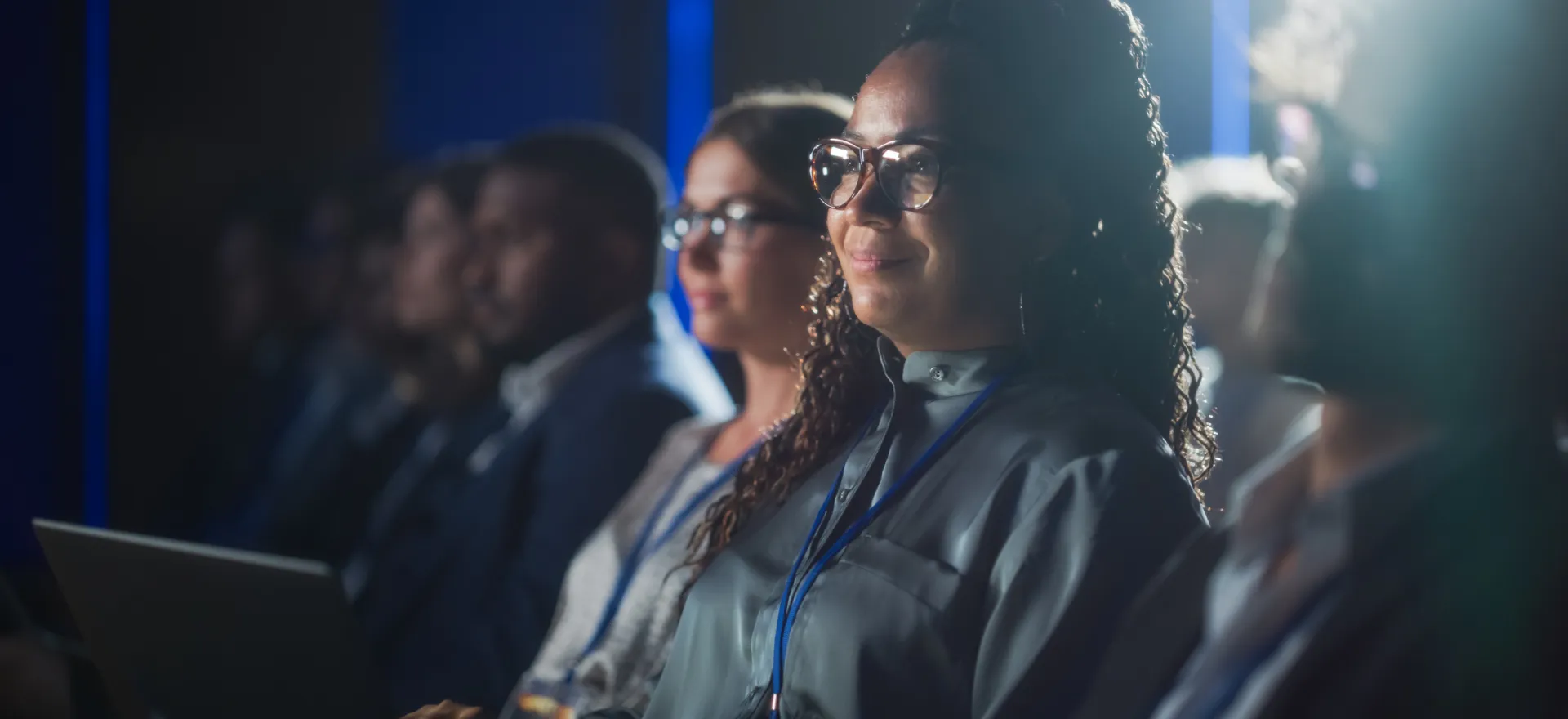 people in audience at conference or event