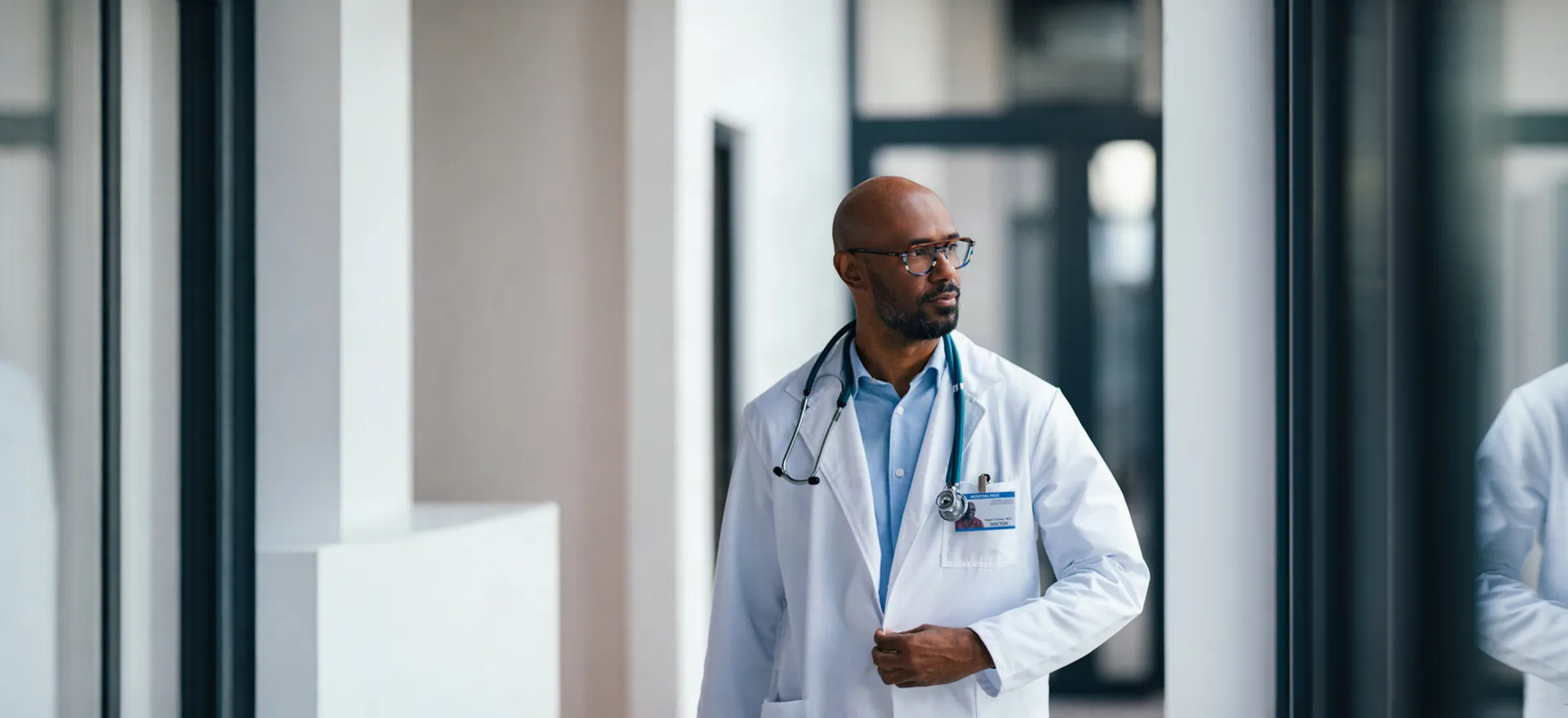 doctor walking down hallway