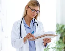 clinician reviewing chart