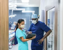 Doctors in acute care discussing treatment