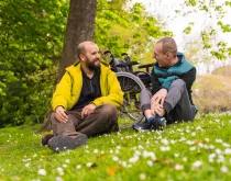 two friends laughing outside
