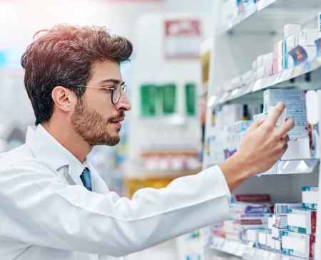 pharmacist looking at medicine