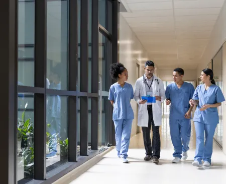 doctor with students in hospital