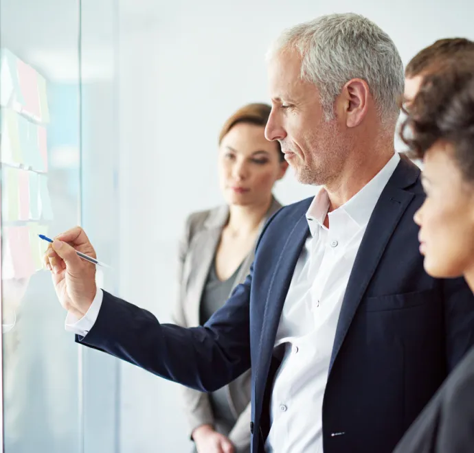Group of colleagues having a brainstorming session at work