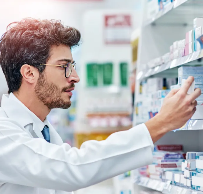 pharmacist looking at medicine