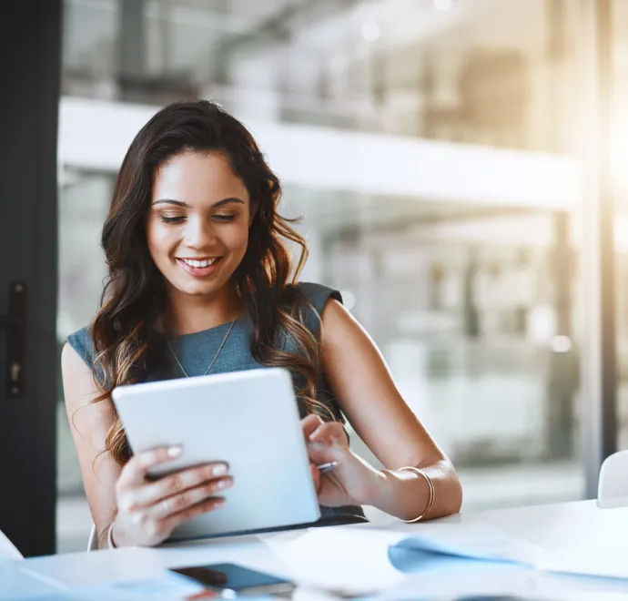 smiling professional woman on tablet