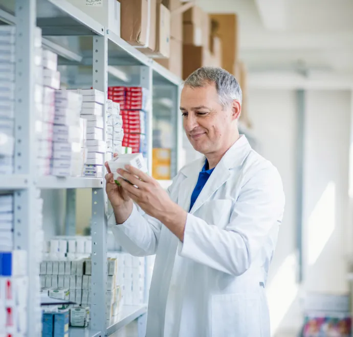 pharmacist looking at medicine