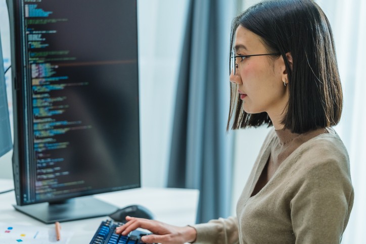 engineer working on software at computer monitor