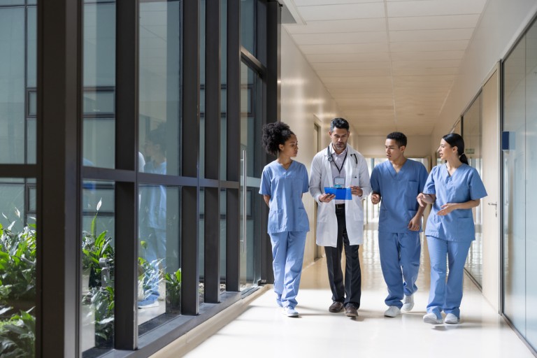 doctor with students in hospital