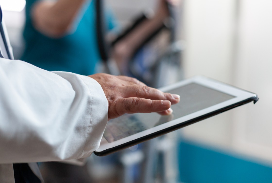 doctor using tablet